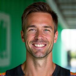 Jake Miller, a Caucasian man in his early 40s, athletic and approachable, with a friendly smile.